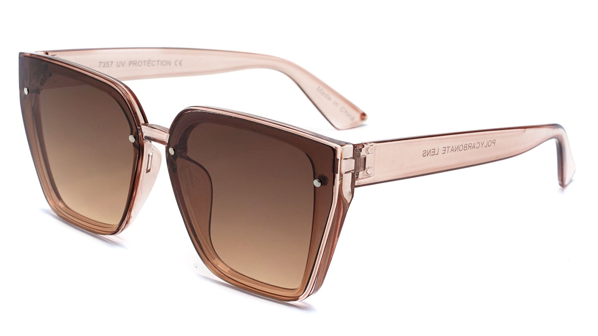 Sunglasses with brown gradient lenses and rose gold frame on a white background